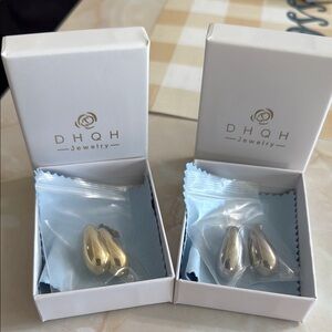 DHQH Fashion Jewelry goldtone and silvertone teardrop style pierced earrings.